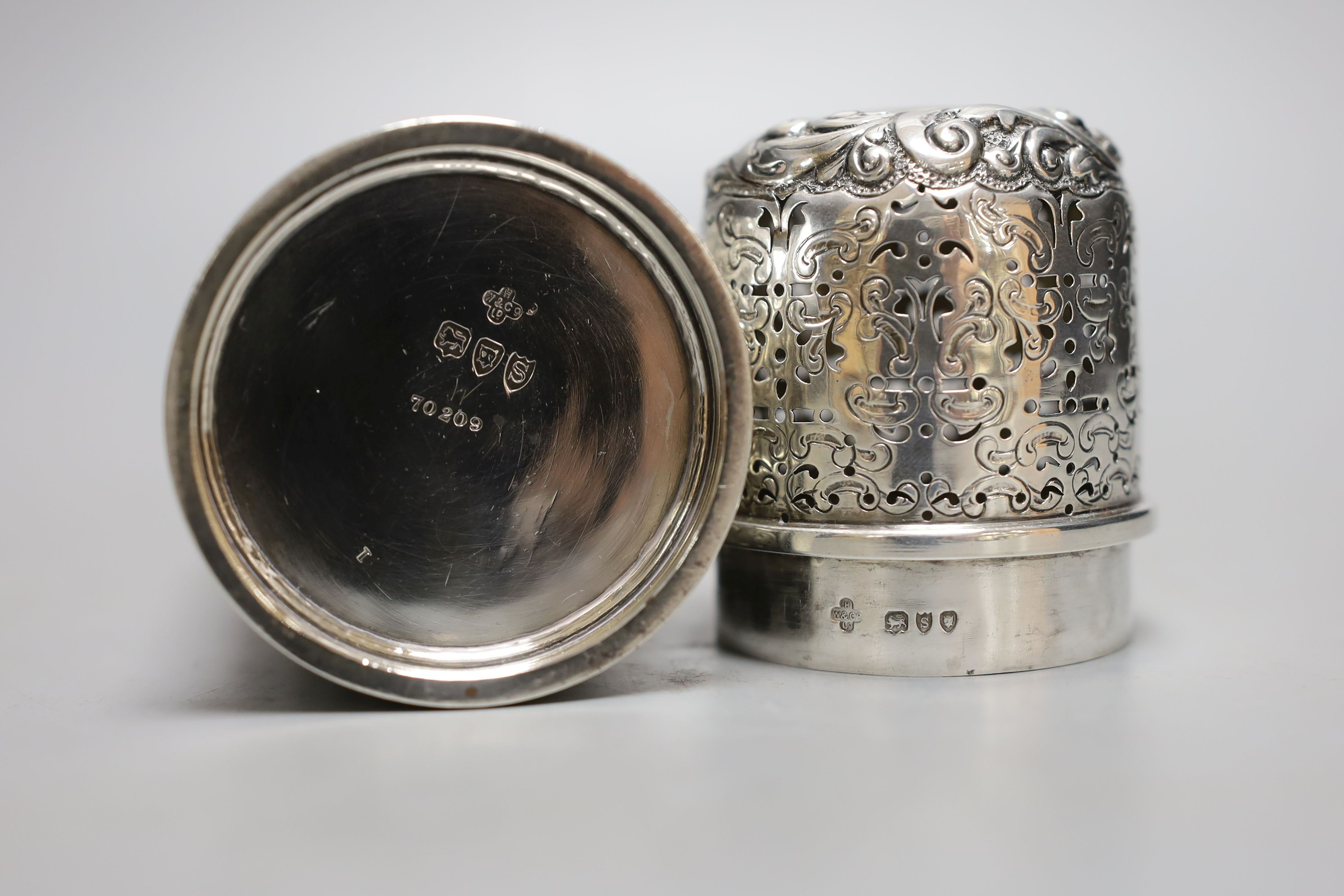 A late Victorian embossed silver lighthouse sugar caster, Horace Woodward & Co, London, 1893, 15.4cm, 5.5oz.